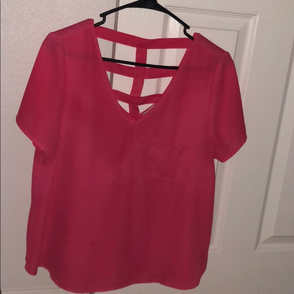 Hot pink, sheer top with strappy back.